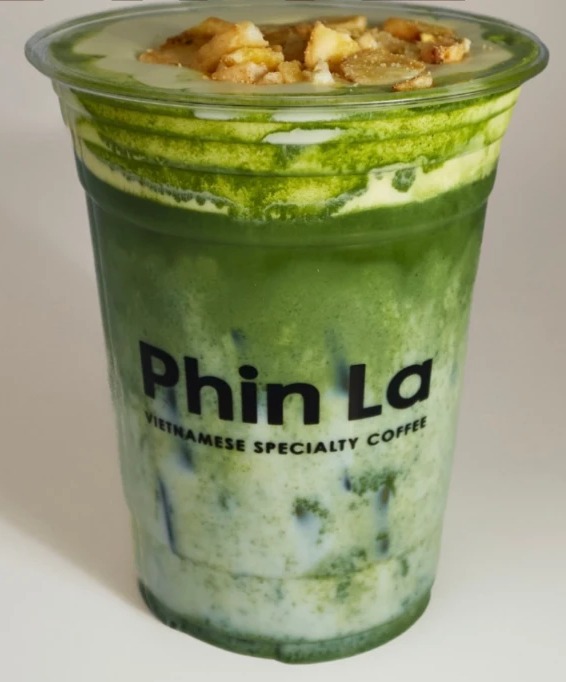 Banana Matcha Latte topped with banana cream and dried banana