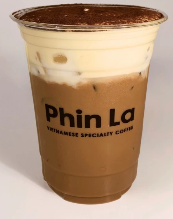 Egg Coffee with a thick cream layer and cocoa dusting